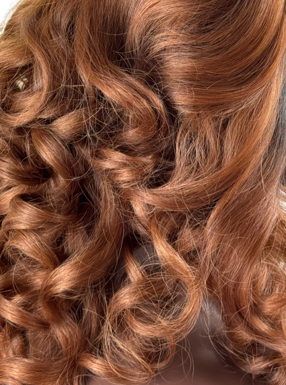 Loose curls in two tone T Part lace front in Ginger with black roots