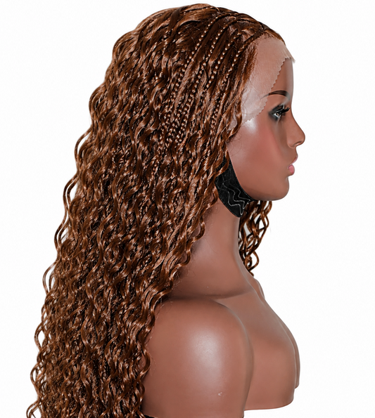 Long, voluminous brown curly wig displayed on a mannequin head and shoulders against a plain white background.